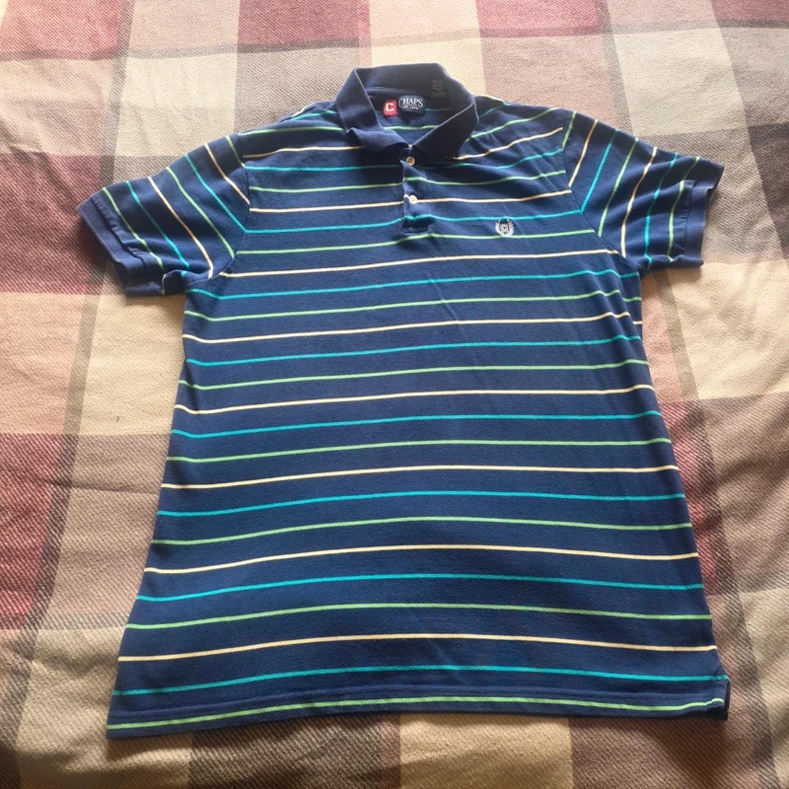 Navy blue short-sleeve polo shirt with horizontal stripes in light blue, teal, and yellow